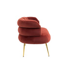 Poltrona di design in velluto con gambe in metallo