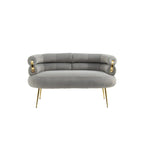 Poltrona di design in velluto con gambe in metallo