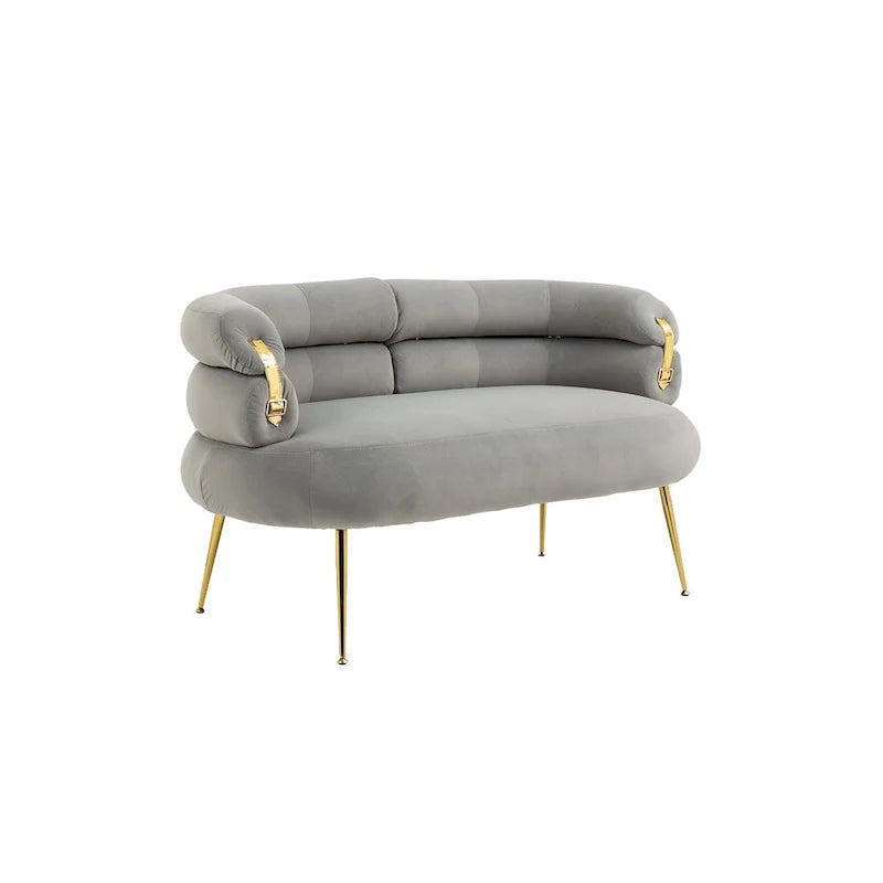 Poltrona di design in velluto con gambe in metallo