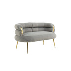 Poltrona di design in velluto con gambe in metallo