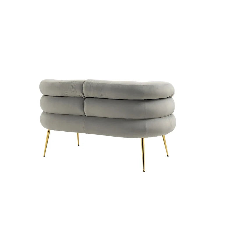 Poltrona di design in velluto con gambe in metallo