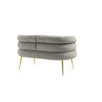 Poltrona di design in velluto con gambe in metallo