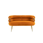 Poltrona di design in velluto con gambe in metallo