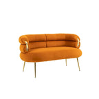 Poltrona di design in velluto con gambe in metallo