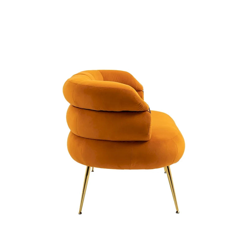 Poltrona di design in velluto con gambe in metallo