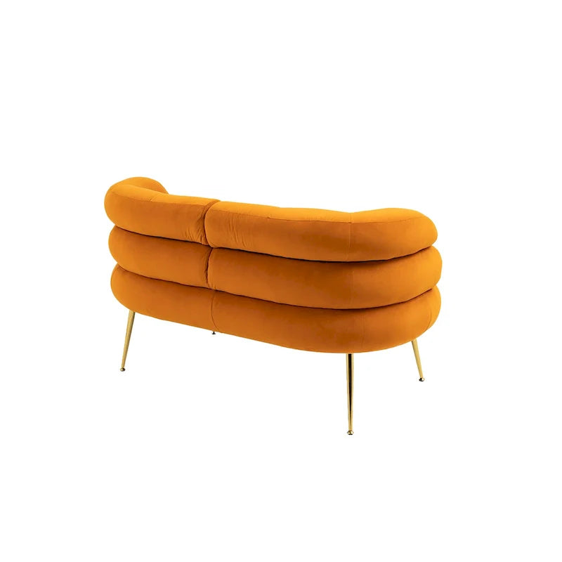 Poltrona di design in velluto con gambe in metallo