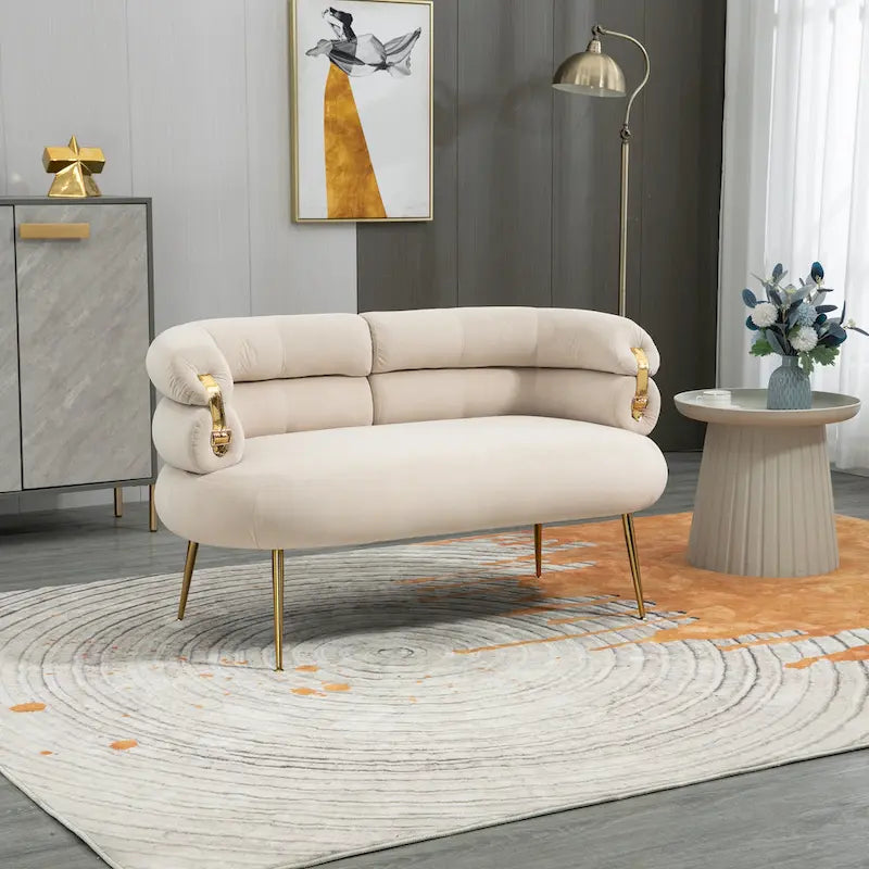 Poltrona di design in velluto con gambe in metallo