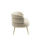 Poltrona di design in velluto con gambe in metallo