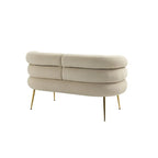Poltrona di design in velluto con gambe in metallo